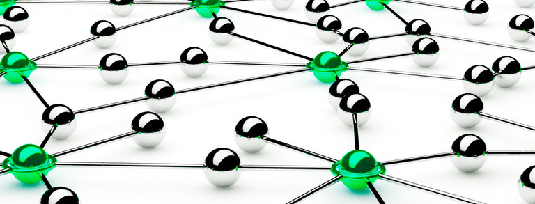 Silver and light green balls on a white background are connected with silver threads